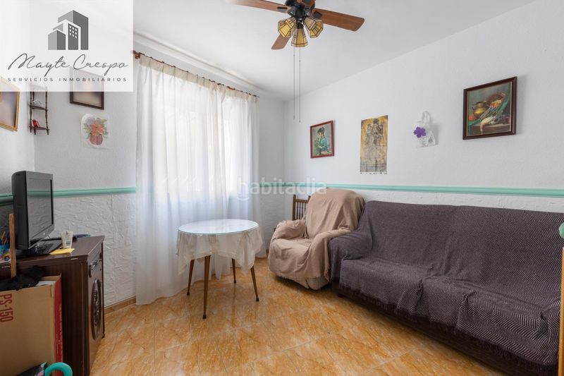 Foto cffe2b7b-265e-4148-a57a-14d659cc4bf9. Casa adossada amb aparcament a Atarfe