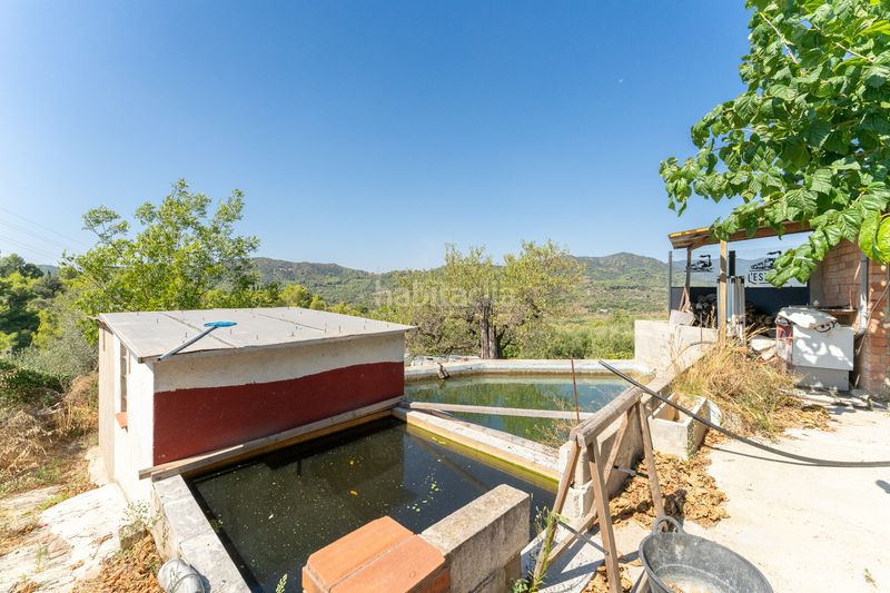 Foto 574e51a9-ce3b-44be-9a93-1444146bcca4. Masia amb xemeneia calefacció aparcament a Alforja