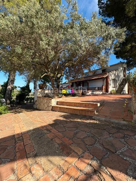 Foto 81a0e487-b968-4d1c-85b6-5523466e0d48. Chalet con camino parcheggio piscina in Montornés-Las Palmas-El Refugio Benicasim / Benicàssim