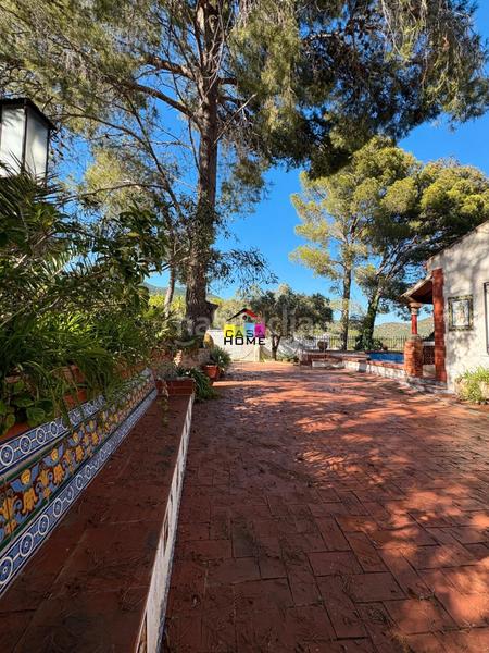 Foto d8c37a6c-7be4-47c8-9b88-e07f8f7c421d. Chalet con camino parcheggio piscina in Montornés-Las Palmas-El Refugio Benicasim / Benicàssim