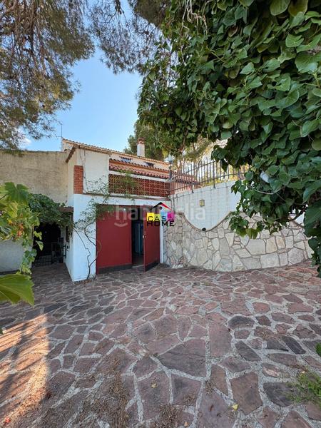 Foto e6345031-6102-4b62-a621-7b8974e9125f. Chalet con camino parcheggio piscina in Montornés-Las Palmas-El Refugio Benicasim / Benicàssim