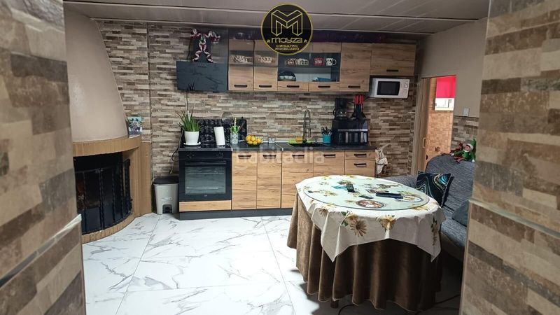 Foto e3bdb81e-2aa9-40ee-8be1-011348c176cb. Casa amb calefacció a Martos