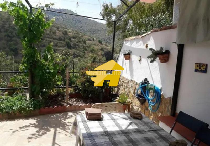 Foto 25e7d1e5-5572-4278-8c4c-c922abb4dd68. Country house with fireplace heating in Olías Málaga