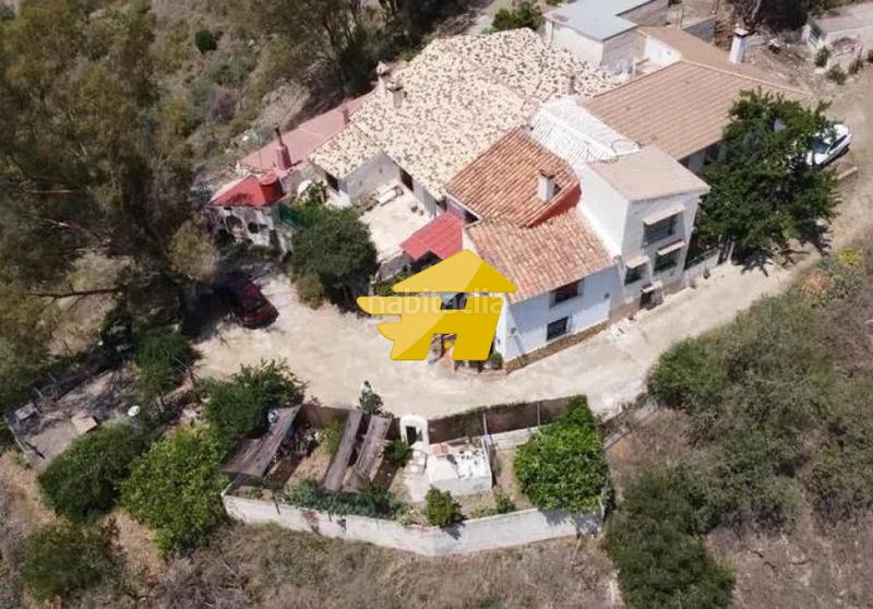 Foto 6a477bb8-e513-4e89-b4a6-372157ab0bf7. Country house with fireplace heating in Olías Málaga