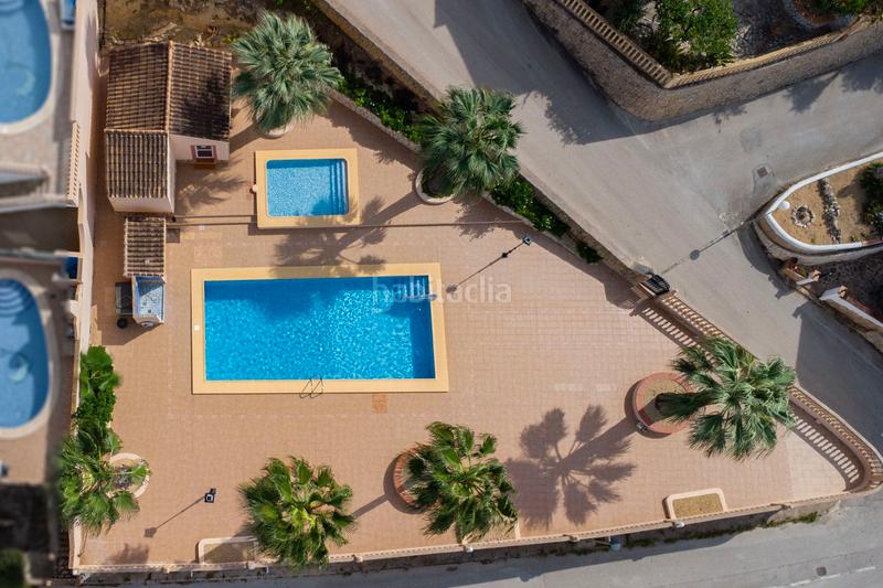 Foto cb654700-eb2a-4c88-a751-db4e8e4654ec. Casa adossada amb aparcament piscina a Centro Poble Nou de Benitatxell (el)