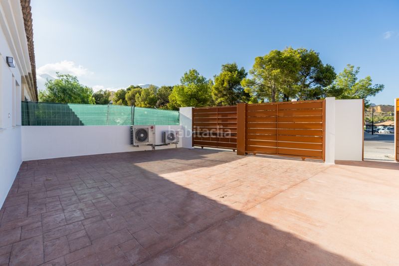 Foto f1e02053-34cb-4c98-8861-bbe6ba05cb38. Casa adossada amb calefacció aparcament piscina a Nucia (la)