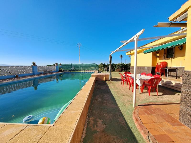 Foto 5abec78f-3d1b-48c4-b00b-33fe10c4ca3e. Chalet mit parking pool in Urbanitzacions i Pedanies Nord Alzira