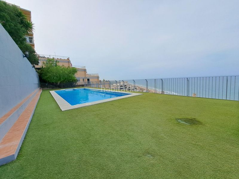 Foto c0f44fa8-f21c-41b2-a465-226fd1b26ea2. Casa adossada amb aparcament piscina a El Faro Cullera