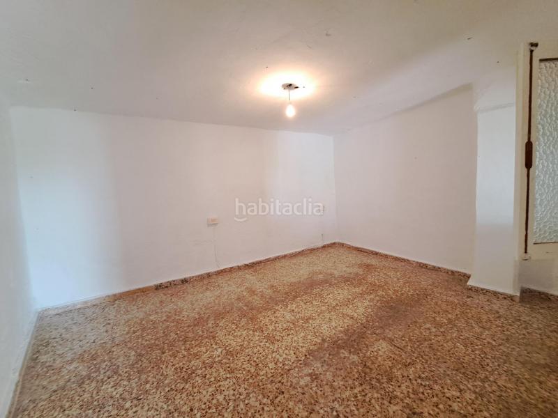 Foto c937d151-98c9-47e6-86c4-5f50a2d2f087. Chalet  en venta en urbanización el respirall en Alzira
