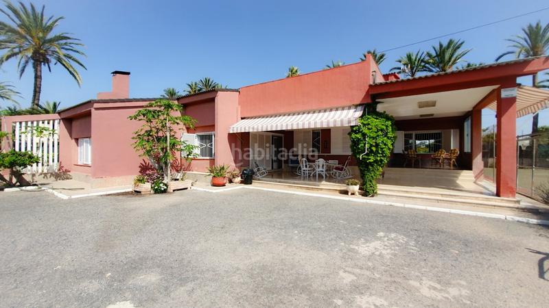 Foto f4cf498f-1a95-4038-8f80-c945b895deda. Chalet venta chalet, casa invitados, piscina, pista deportiva, huerto, zona hospital elche en Elche / Elx