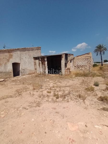 Foto 196c9167-8de3-4b2d-85de-7494956f0ce3. Masía finca rústica en Las Bayas oportunidad de reforma a pocos minutos del mar en Elche / Elx