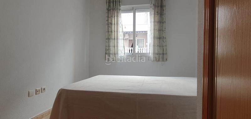 Foto 2657a1e5-d89d-4717-b413-ae78fd55be55. Piso en calle loma la 48 tu apartamento centrico, con piscina y con plaza de garaje en Torrevieja
