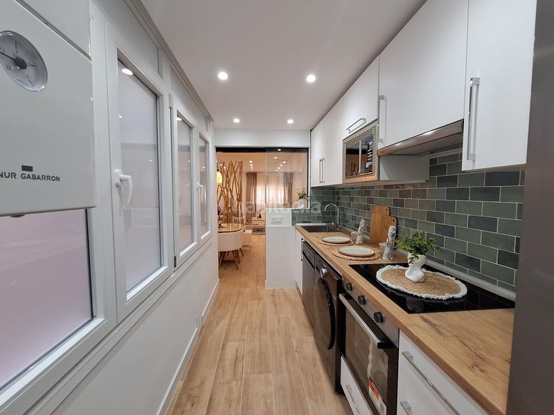 Foto 093419c8-d600-411a-a424-7c2f574586de. Planta baixa amb calefacció a Zarzaquemada Leganés