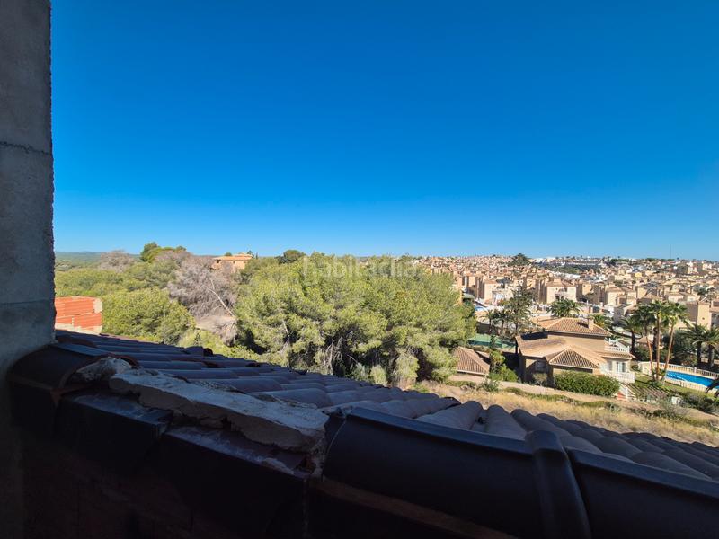 Foto 58a6a590-bdc8-4d47-809c-b942760e6f49. Chalet en calle sierra nevada 11 en Villamartín-Las Filipinas Orihuela