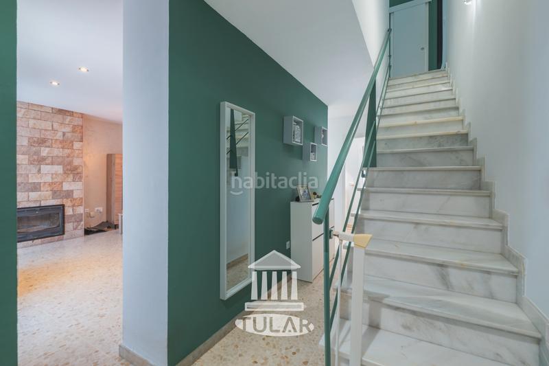 Foto d9565c7e-82db-4acc-a2c3-bcb6096a2b37. Casa adossada amb xemeneia aparcament a El Juncal - Vallealto Puerto de Santa María (El)