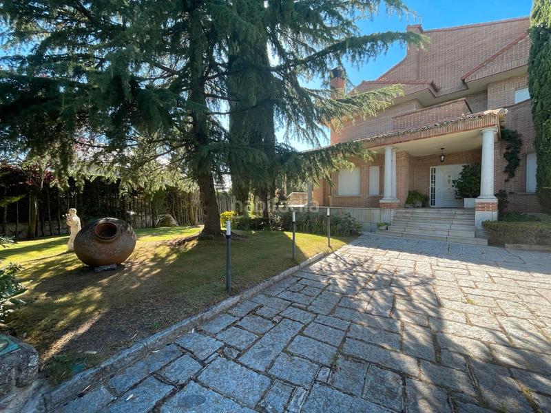 Foto 5ca2939c-752c-4b5c-89c9-f08d5b54808f. Casa amb xemeneia calefacció aparcament piscina a Torrelodones