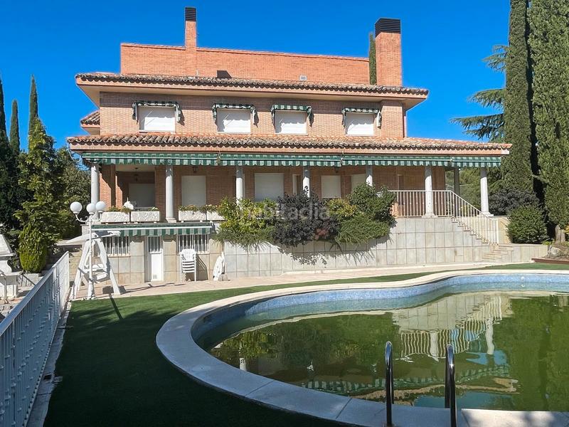 Foto 82d37f21-9292-4988-8098-65c26a9f4e87. Casa amb xemeneia calefacció aparcament piscina a Torrelodones