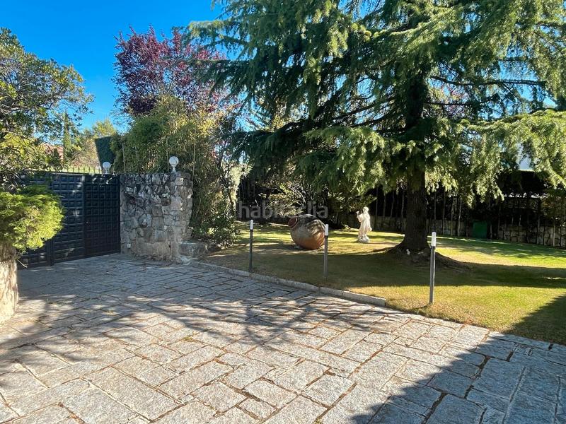 Foto cc56c81b-d3f4-4eb0-bedc-8e688d2c82e4. Casa amb xemeneia calefacció aparcament piscina a Torrelodones