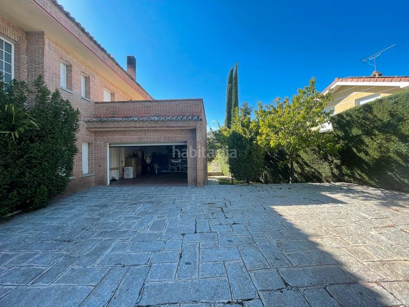 Foto f4bea22e-472d-4b9e-b007-b2f0021f19ab. Casa amb xemeneia calefacció aparcament piscina a Torrelodones