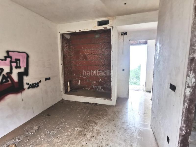 Foto a999efeb-4247-4275-a7ab-cefec64798fa. Casa en poblat ibèric puig del castellet 12 casa en construccion en Lloret de Mar
