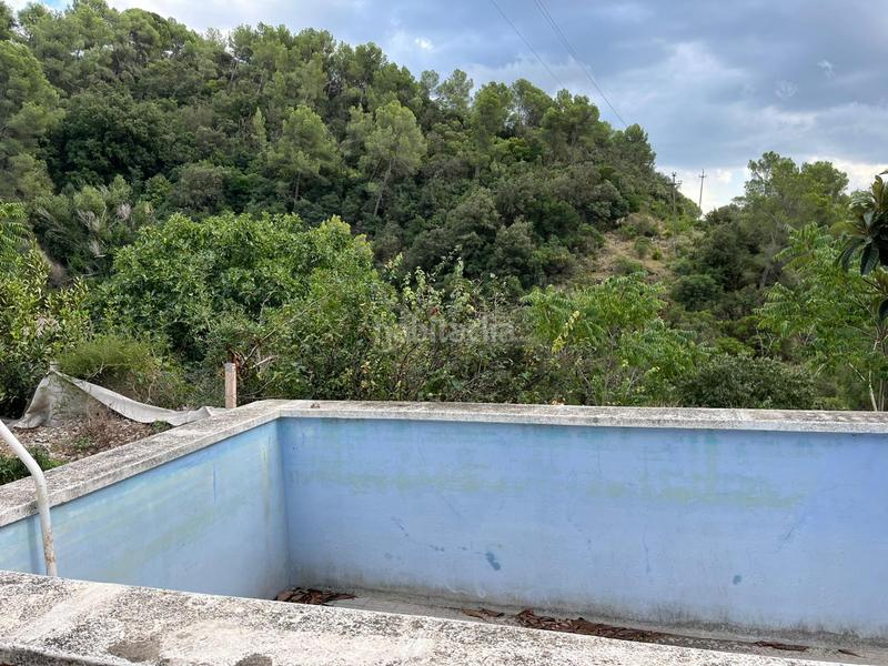 Foto a70232fe-eec2-4a6a-941c-b0ddc85738db. Casa amb aparcament piscina a Olesa de Montserrat