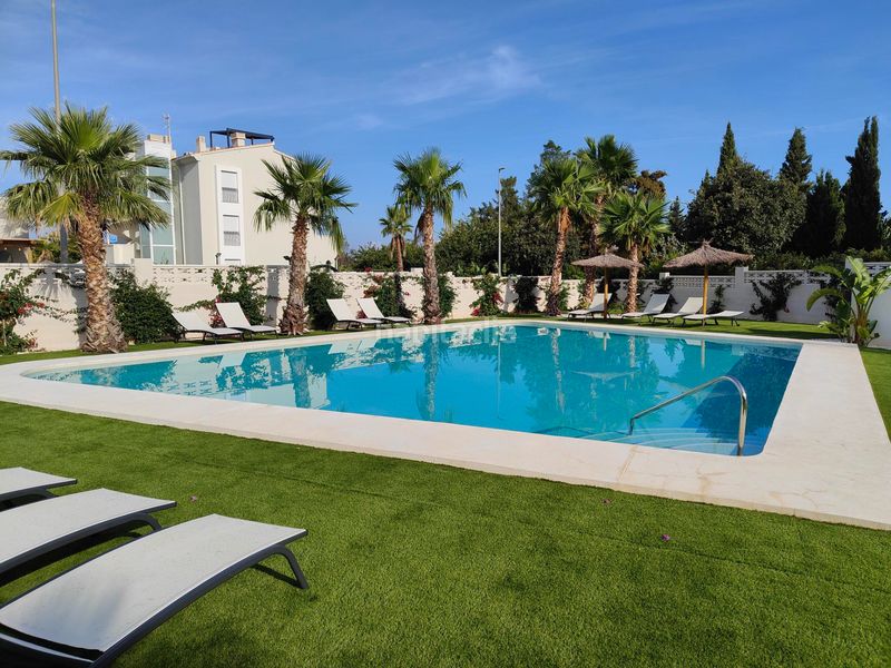 Foto 8ff2da73-35ef-42e4-b34e-39f272430341. Planta baixa amb calefacció aparcament piscina a Dénia