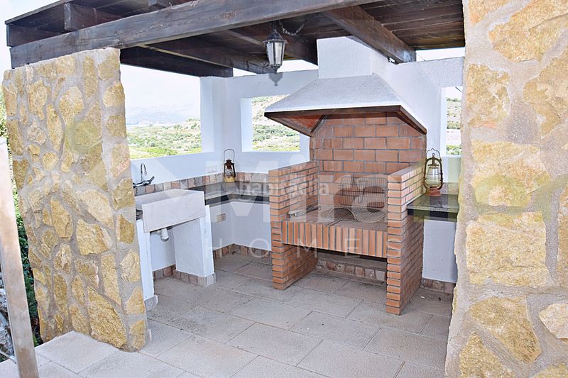 Foto bd2cd173-396e-46fa-a27a-05966b5745d8. Chalet with fireplace heating parking pool in Font d´en Carròs (la)