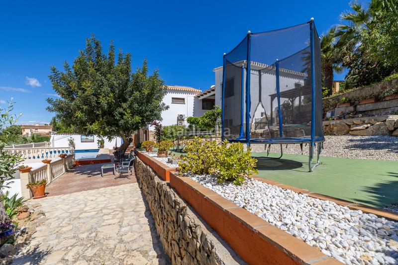 Foto 0d0d453f-b195-4526-a0fa-84a4580ac984. Chalet en venta en denia este acogedor y soleado chalet de estilo rústico, con unas vistas impresionantes al montgó en Dénia