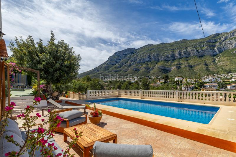 Foto 61161666-3fa8-4b79-8a40-b1d875391043. Chalet en venta en denia este acogedor y soleado chalet de estilo rústico, con unas vistas impresionantes al montgó en Dénia