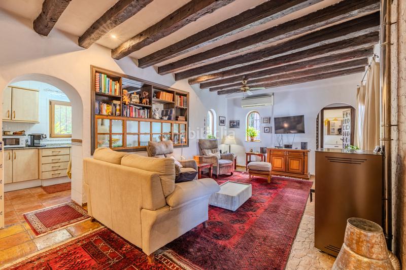 Foto 65f7e155-f5e4-4db9-9998-64a71b83481b. Chalet en venta en denia este acogedor y soleado chalet de estilo rústico, con unas vistas impresionantes al montgó en Dénia