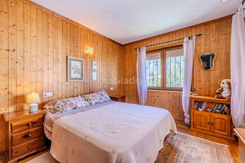Foto 6e3bb979-7a71-4cdf-b177-f67a38d645ca. Chalet en venta en denia este acogedor y soleado chalet de estilo rústico, con unas vistas impresionantes al montgó en Dénia