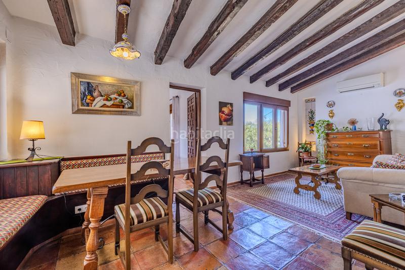 Foto 7dc99f52-0a39-426b-af51-aa70ef66ba68. Chalet en venta en denia este acogedor y soleado chalet de estilo rústico, con unas vistas impresionantes al montgó en Dénia