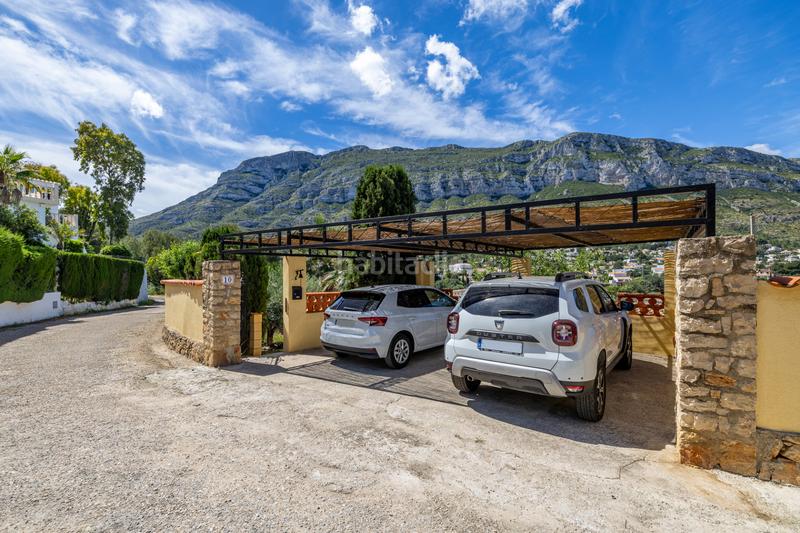 Foto afcc71f6-18ba-4005-99fe-ad45f43c0a4c. Chalet en venta en denia este acogedor y soleado chalet de estilo rústico, con unas vistas impresionantes al montgó en Dénia