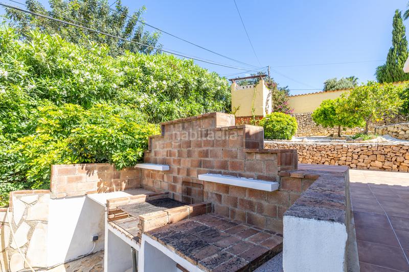 Foto b26a1bba-0502-4e8e-be9d-ff6564a5b27a. Chalet en venta en denia este acogedor y soleado chalet de estilo rústico, con unas vistas impresionantes al montgó en Dénia