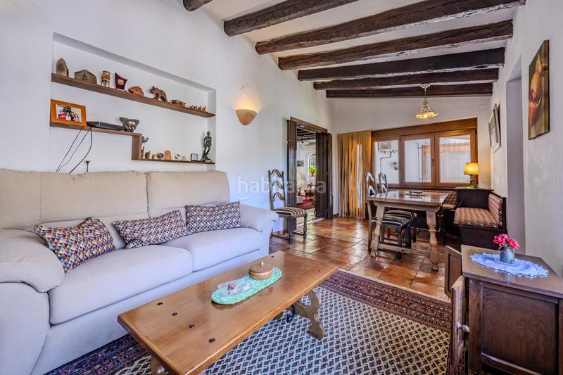Foto b54fe043-fae0-407e-98a4-56f9f36804c6. Chalet en venta en denia este acogedor y soleado chalet de estilo rústico, con unas vistas impresionantes al montgó en Dénia