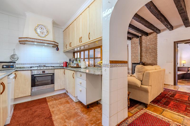 Foto c43c4544-91e8-48db-bf44-3a7a1f0d9020. Chalet en venta en denia este acogedor y soleado chalet de estilo rústico, con unas vistas impresionantes al montgó en Dénia