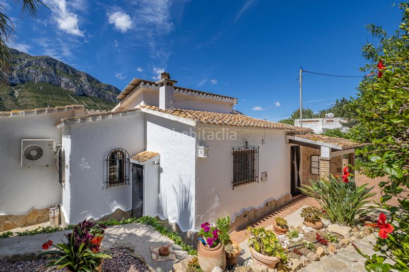Foto fb2099e9-da82-4a71-81bf-37d03369de7b. Chalet en venta en denia este acogedor y soleado chalet de estilo rústico, con unas vistas impresionantes al montgó en Dénia