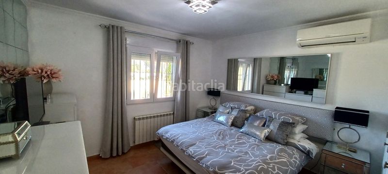 Foto f9b41939-0859-41cb-8dd8-2126e71ca504. Xalet amb calefacció aparcament piscina a El Montgó Dénia