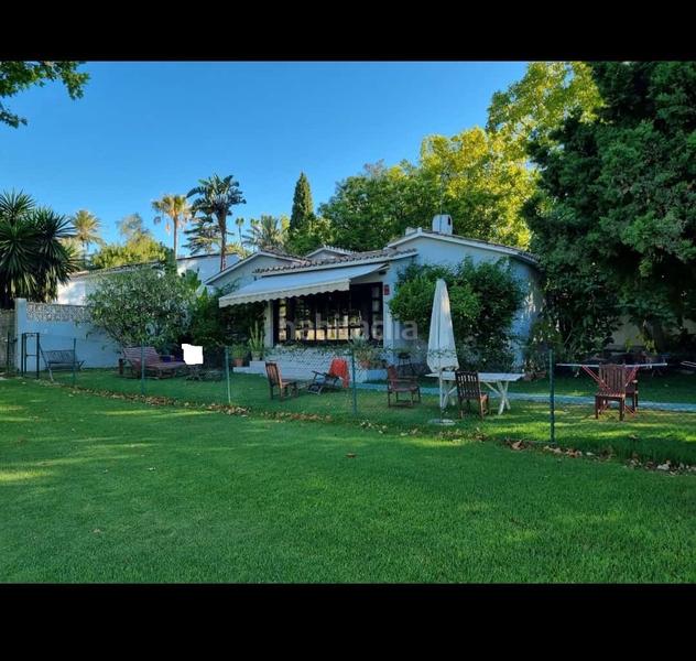 Foto c6057721-ef1e-47ba-b802-7f58dab9afb4. Chalet  indendiente en una planta,se puede hacer una 2a planta, parking 2 coches y vistas golf en urb.Guadalmina Alta- en Marbella