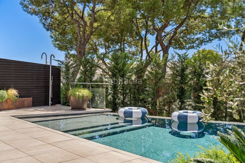 Foto 4f7fe0f6-d747-4a5c-b53a-636f1e3a72d1. Casa aparellada amb aparcament piscina a Sierra Blanca Marbella