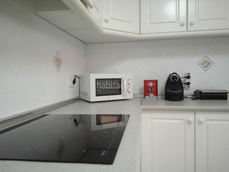 Foto f1cef1c0-34ad-48b4-8170-f0d91c983b5d. Rent flat with parking pool in Playa Muchavista Campello (el)