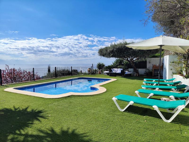 Foto 1463b855-0680-42b5-8175-b2719174c0e6. Chalet preciosa villa con vistas mar y con licencia turistica! en Lloret de Mar