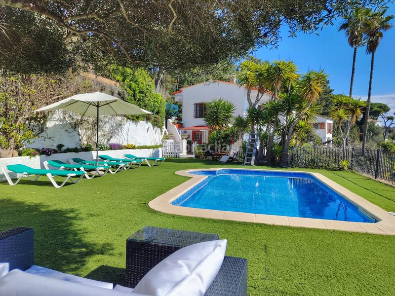 Foto 8afbc3b9-1b37-4cff-af4f-372e959d60fb. Chalet preciosa villa con vistas mar y con licencia turistica! en Lloret de Mar