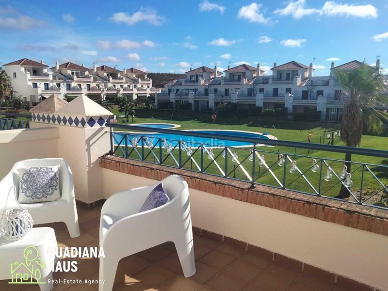 Foto bf7af543-0dfe-467f-9b35-0c2996a596dc. Casa adossada a avenida rosalia de castro 5 a Costa Esuri Ayamonte