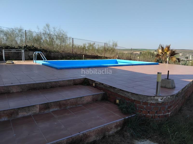Foto 83c8ac42-a6e2-4fed-817b-e4c7e7abb531. Casa aoc vende casa independiente en terreno de 2797m2, con piscina y garage en Palomeque