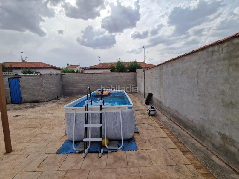 Foto 225f1999-12b3-424c-8d25-5600a01e1ac8. Casa aparellada amb calefacció aparcament piscina a Carmena