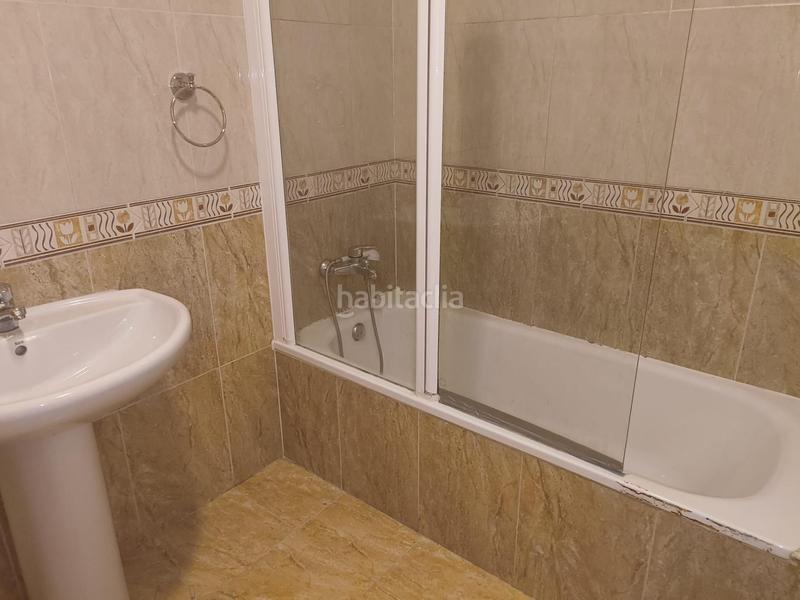 Foto 5aa52783-3b57-4972-a3e8-ea1f3fd02ad2. Casa adossada amb calefacció aparcament a Las Lomas Seseña