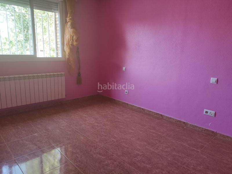 Foto cdb13b4e-0457-4900-b10c-71cd4474a0f6. Casa adossada amb calefacció aparcament a Las Lomas Seseña