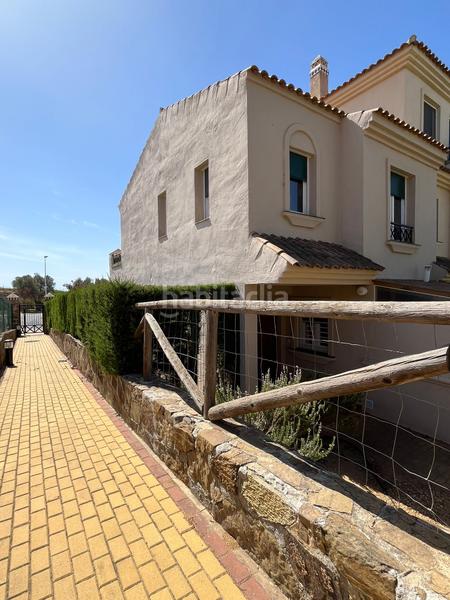 Foto 58ce230e-8304-4349-b86b-205ea6f1e3ce. Casa adossada a calle rubén darío 33 a Costa Esuri Ayamonte