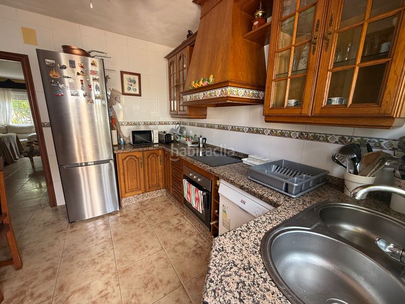 Foto 996458b8-119c-4ac1-a5de-8957d8aa90e6. Casa adossada amb xemeneia calefacció aparcament a Aljaraque